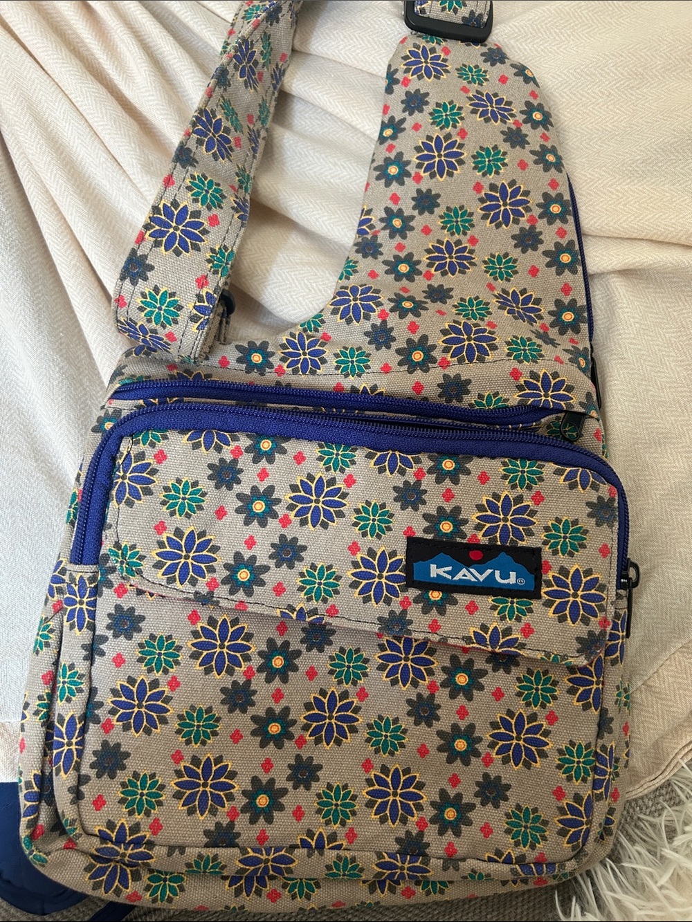 Kavu Beige Floral Sling Bag with Blue, Green & Red Flower Accents